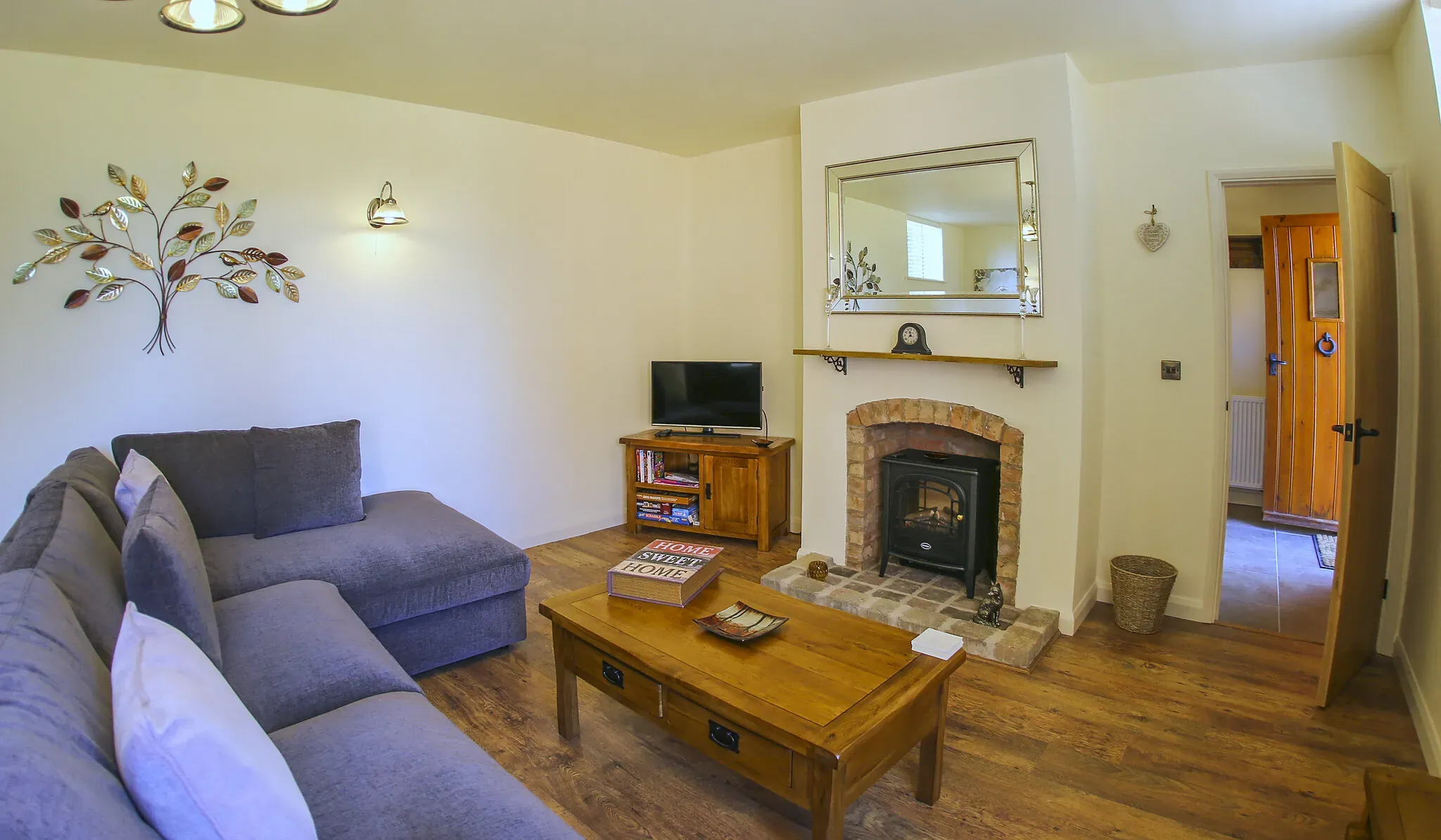Second view of the Oak Barn lounge-diner looking towards the sofa and TV